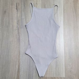Wilfred Annecy bodysuit